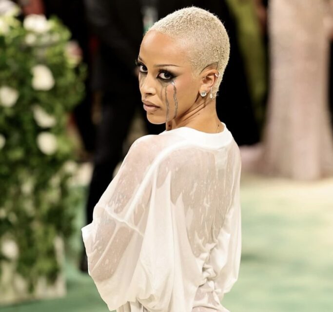 Doja Cat made a splash at the 2024 Met Gala, arriving in a wet dress after leaving her hotel wrapped in a towel